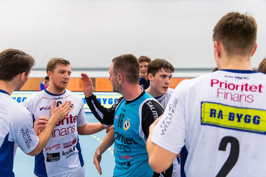 Redbergslids Anton Gustafsson och målvakt  Andreas Palicka