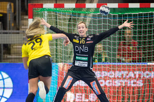 Frida Rosell of Sävehof shoots against Goalkeeper Katrine