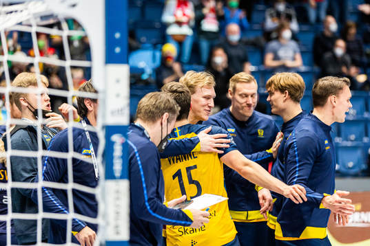 Eric Johansson of Sweden celebrates with team mates