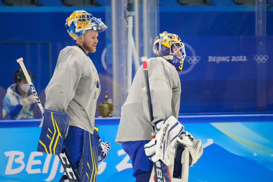 Goaltenders Magnus Hellberg and Lars Johansson of the
