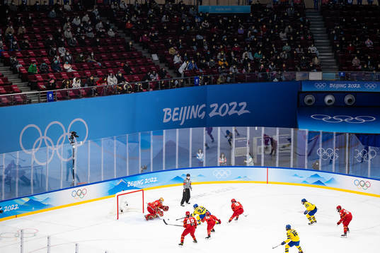 goaltender Jiaying Zhou of China and Olivia Carlsson of