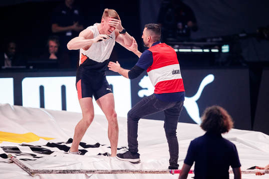 Piotr Lisek of Poland is in pain