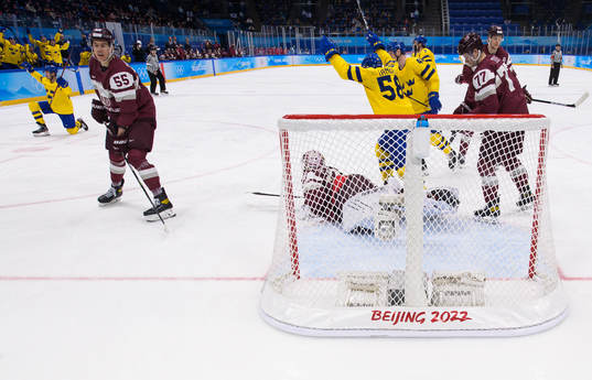 Lucas Wallmark of Sweden (L) celebrates