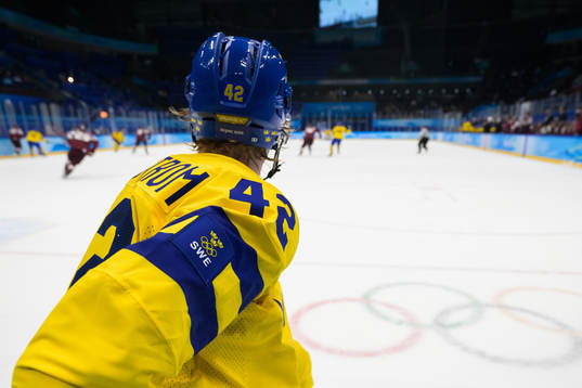 A patch with the Swedish Three Crowns and Olympic Rings