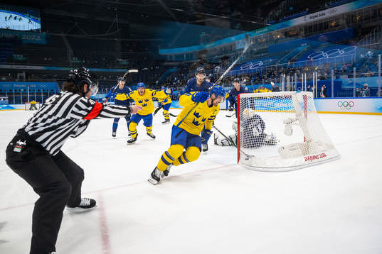 Carl Klingberg and Anton Lander of Sweden celebrates