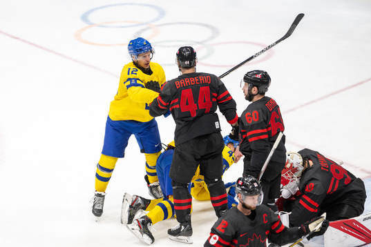 Max Friberg of Sweden and Mark Barberio of Canada in the
