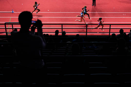 Athletes compete in women’s 400 meter qualification