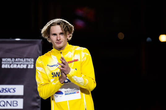 Carl Bengtström of Sweden celebrates with his bronze medal
