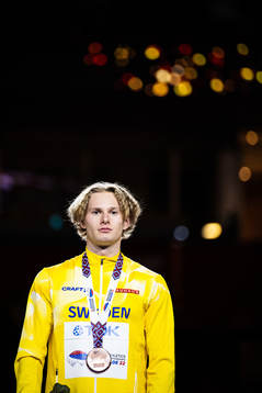 Carl Bengtström of Sweden celebrates with his bronze medal
