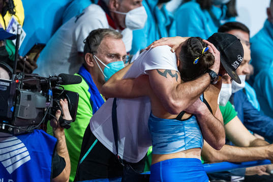 Maryna Bekh-Romanchuk of Ukraine cries and celebrates in