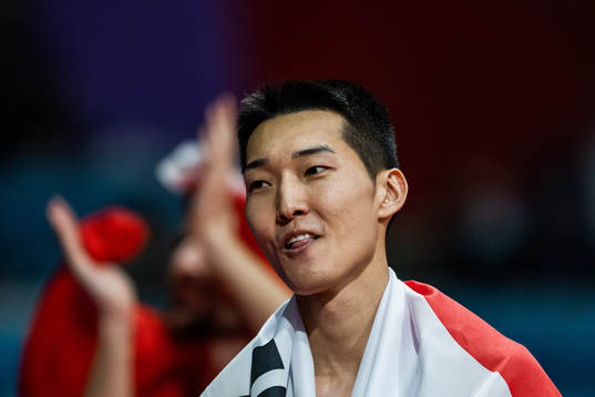 Sanghyeok Woo of South Korea celebrates