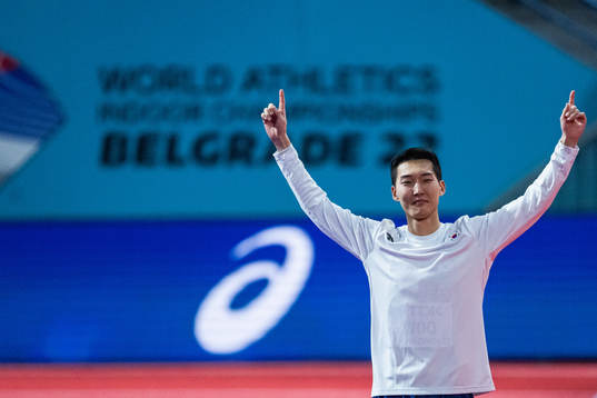Sanghyeok Woo of South Korea celebrates