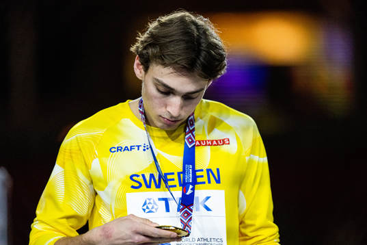 Armand Duplantis of Sweden celebrates with his gold medal