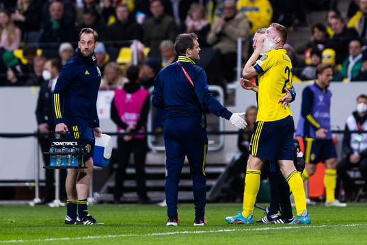Dejan Kulusevski of Sweden with an ice pack against his