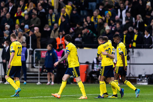 Robin Quaison and Jesper Karlström of Sweden celebrate