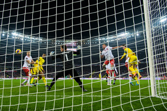 Robin Quaison and Victor Nilsson Lindelöf of Sweden attack