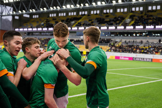 Players of Ireland celebrate with Ross Tierney