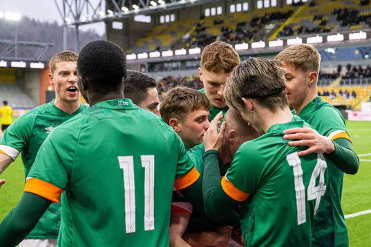Team mates celebrate with Ross Tierney of Ireland who