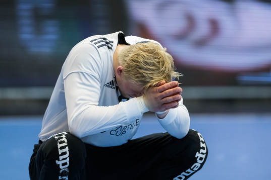 goalkeeper Bertram Obling of Sävehof looks dejected