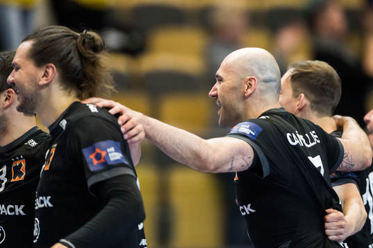Joan Reixach Canellas of Kadetten celebrates with team mates