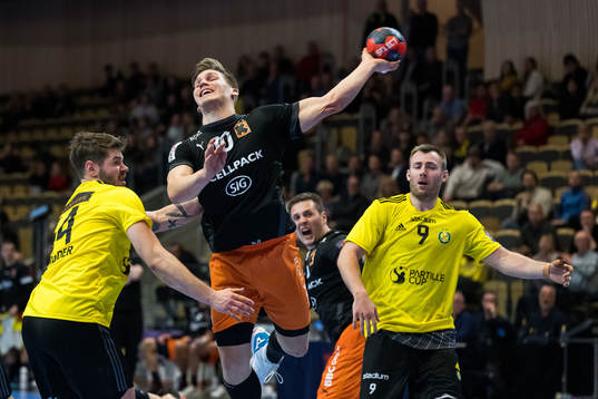 Rune Schröder and Vetle Eck Aga of Sävehof defend against