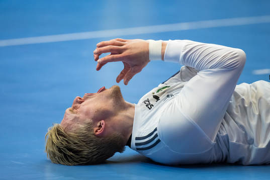 goalkeeper Bertram Obling of Sävehof looks dejected