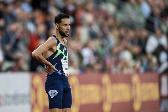 Mounir Akbache of France looks dejected
