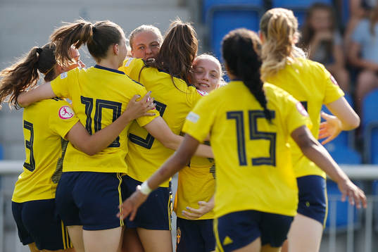 Players of Sweden celebrate the goal
