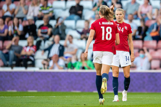 Frida Maanum and Ada Hegerberg of Norway celebrate 2-0