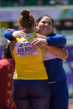 Grete Ahlberg of Sweden gets a hug from Beatrice Nedberge