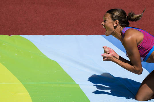 Anna Hall of USA celebrates when competing in women’s