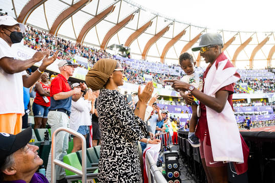 Mutaz Essa Barshim of Qatar celebrates with his wife