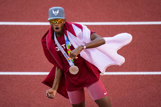Mutaz Essa Barshim of Qatar celebrates
