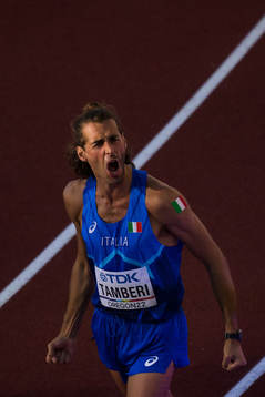Gianmarco Tamberi of Italy celebrates when competing in