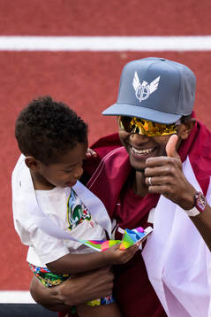 Mutaz Essa Barshim of Qatar celebrates together with his