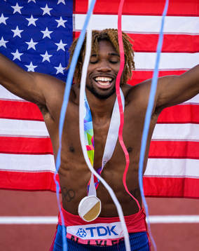Noah Lyles of USA celebrates