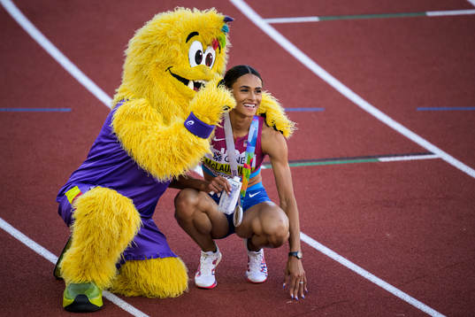 Sydney McLaughlin of USA celebrates with the championship