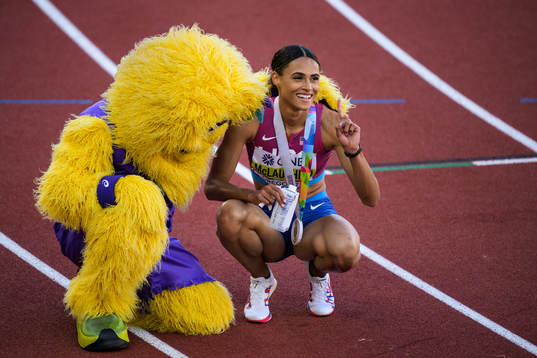 Sydney McLaughlin of USA celebrates with the championship