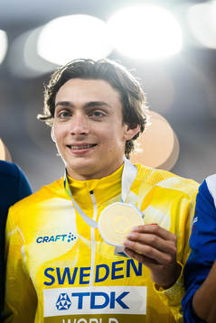 Armand Duplantis of Sweden with his gold medal at the medal