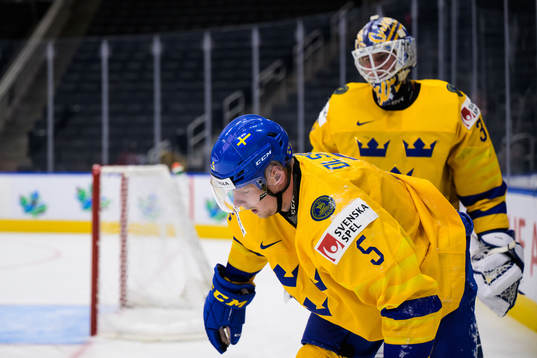 Anton Olsson of Sweden being hurt