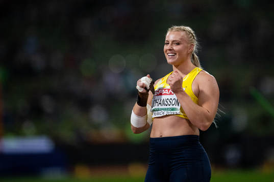 Axelina Johansson of Sweden celebrates when competing in