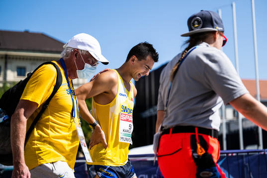 Perseus Karlström of Sweden with team doctor Sverker