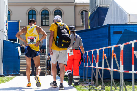 Perseus Karlström of Sweden with team doctor Sverker
