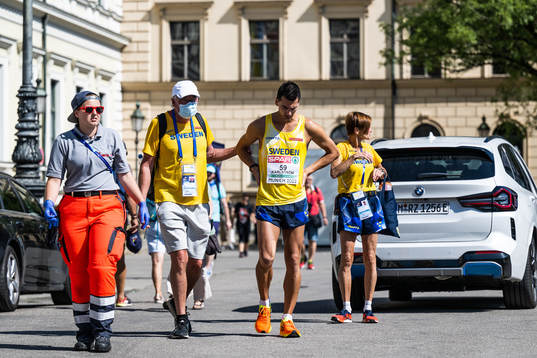 Perseus Karlström of Sweden with team doctor Sverker
