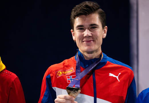 Jakob Ingebrigtsen of Norway celebrates with his gold medal