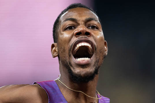 Zharnel Hughes of Great Britain celebrates