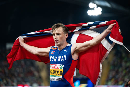 Karsten Warholm of Norway celebrates