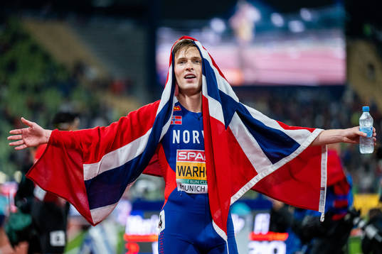 Karsten Warholm of Norway celebrates
