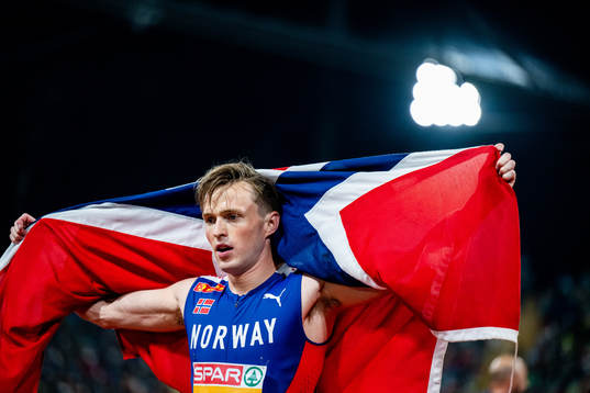 Karsten Warholm of Norway celebrates