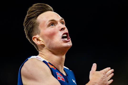 Karsten Warholm of Norway celebrates